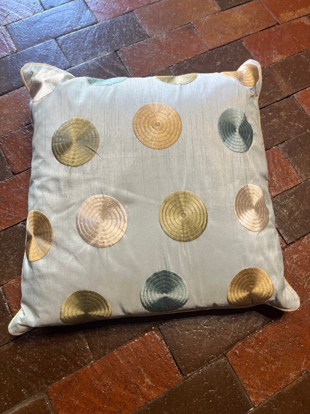 18” X 18” square pillow is blue with green gold, white, and aqua circles 2318
